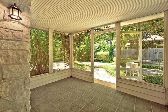 a view of an empty room and window