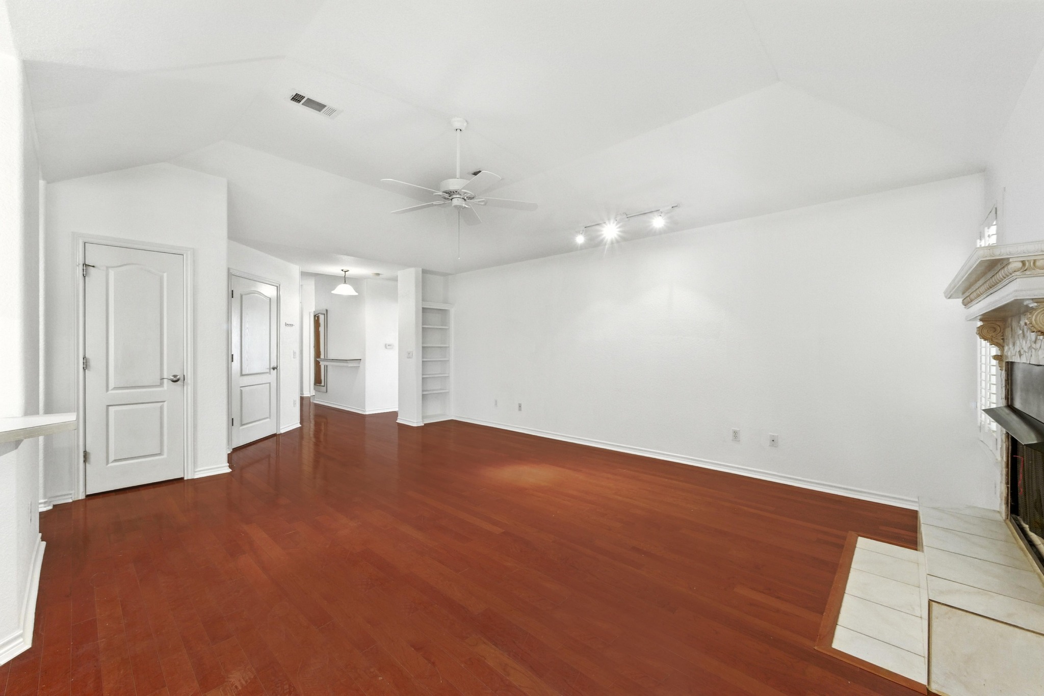 125 Melissa Court Georgetown, TX 78628 - Photo 7 of 29 a view of empty room with wooden floor