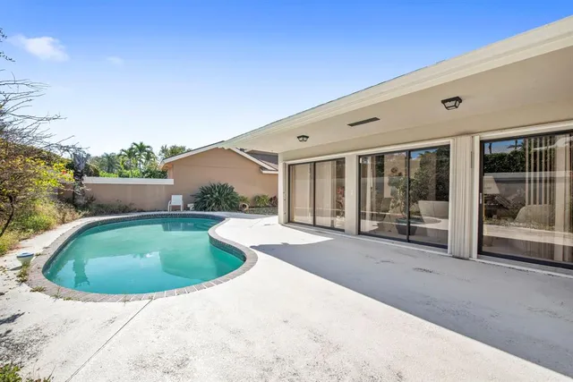 a view of outdoor space yard and swimming pool