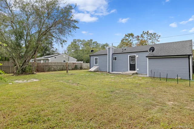 a house view with a garden space
