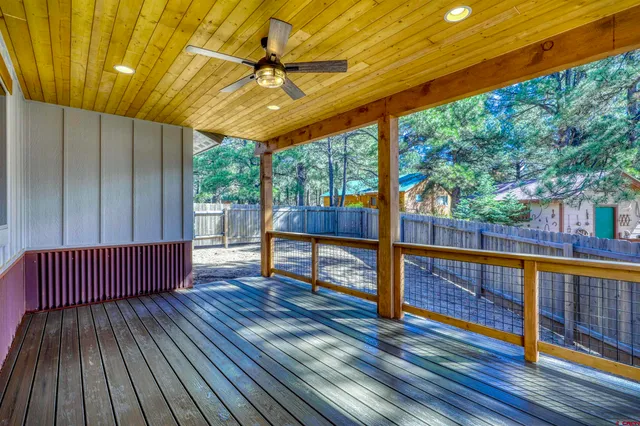 a backyard of a house with green landscape