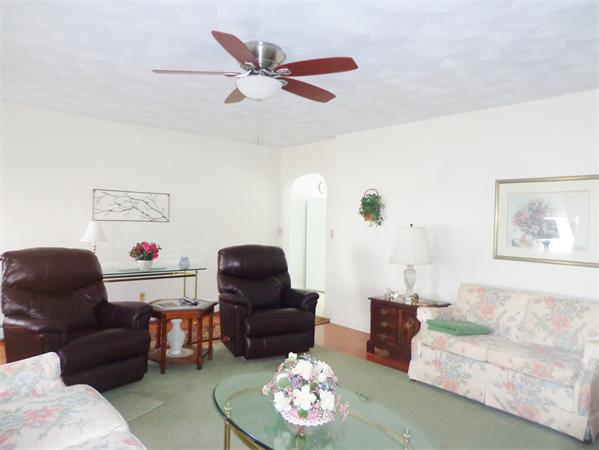 17-23 North Street Three Rivers, MA 01080 - Photo 4 of 29 a living room with furniture and a large window