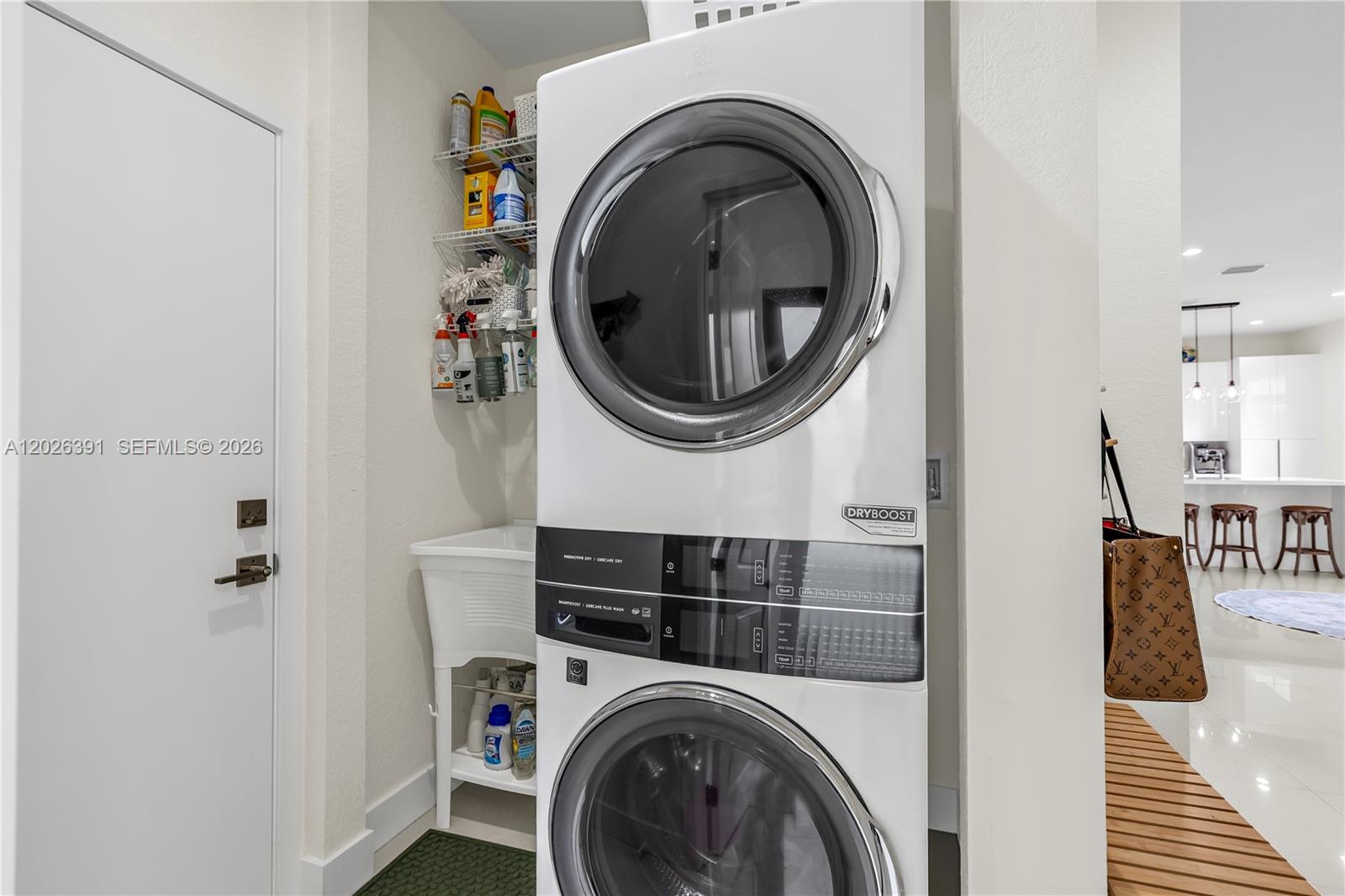 14606 Southwest 22nd Terrace Miami, FL 33175 - Photo 29 of 43 a view of a storage and utility room with washer and dryer