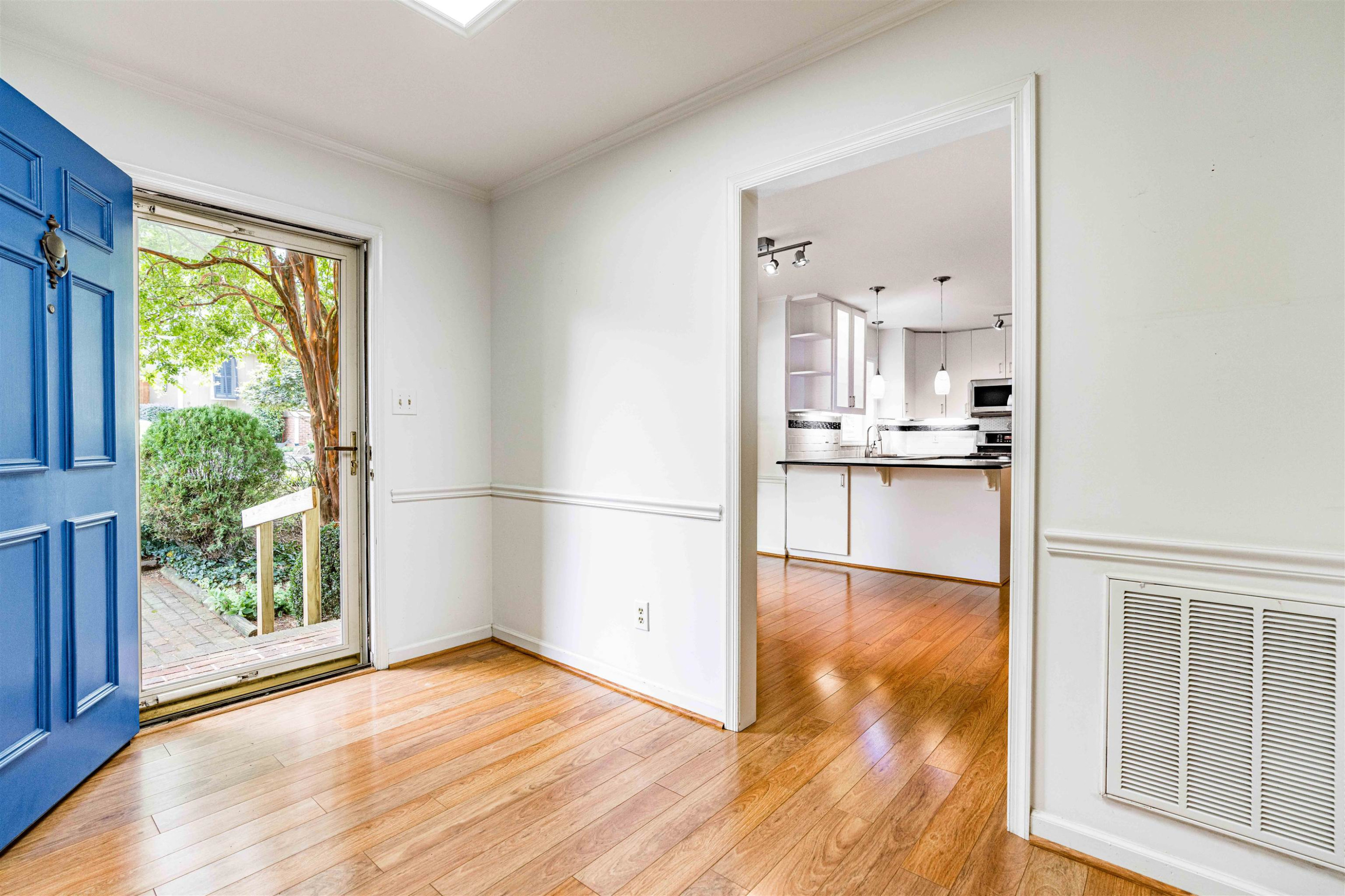 3013 Rue Sans Famille Raleigh, NC 27607 - Photo 4 of 16 a view of kitchen and wooden floor
