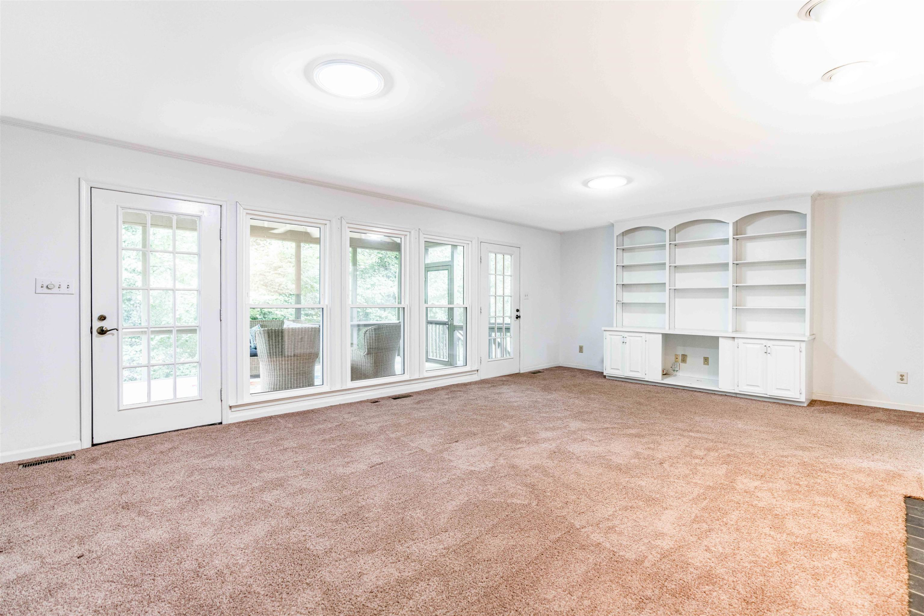 3013 Rue Sans Famille Raleigh, NC 27607 - Photo 6 of 16 an empty room with a balcony