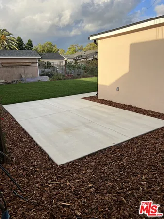 a front view of a house with yard