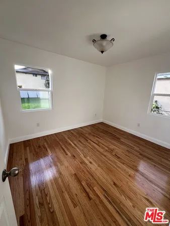 a bathroom with a bathtub and a toilet
