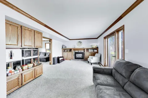 a view of a furniture and an empty room