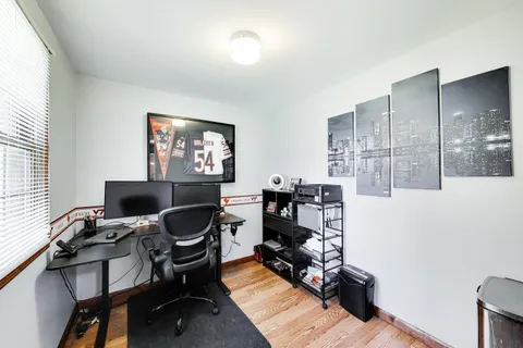 a bedroom with a bed furniture and couch