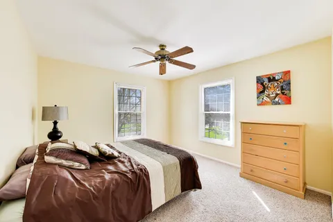 a view of a room with wooden walls
