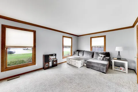 a view of a dining room with furniture