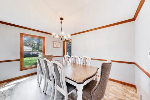 a kitchen with stainless steel appliances a stove sink microwave and cabinets