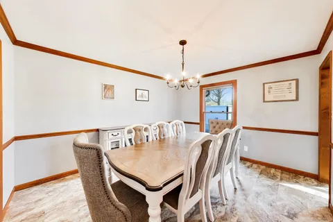 a kitchen with stainless steel appliances granite countertop a stove and a refrigerator