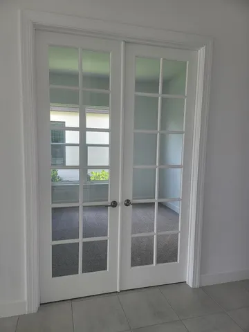 a view of an empty room with empty room