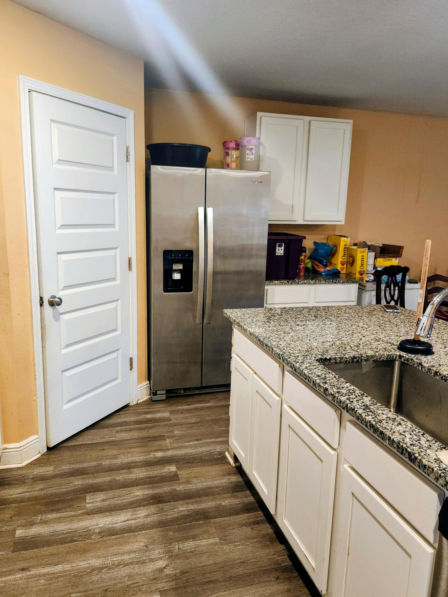 167 Apache Drive DeFuniak Springs, FL 32435 - Photo 17 of 18 a kitchen with granite countertop a refrigerator and stove