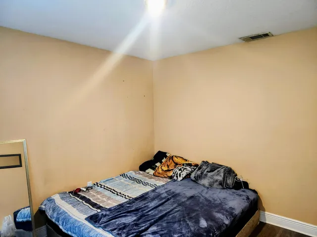 a bedroom with a bed