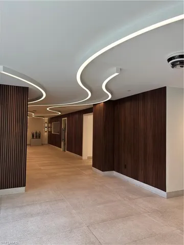 a large room with kitchen island granite countertop lots of counter top space