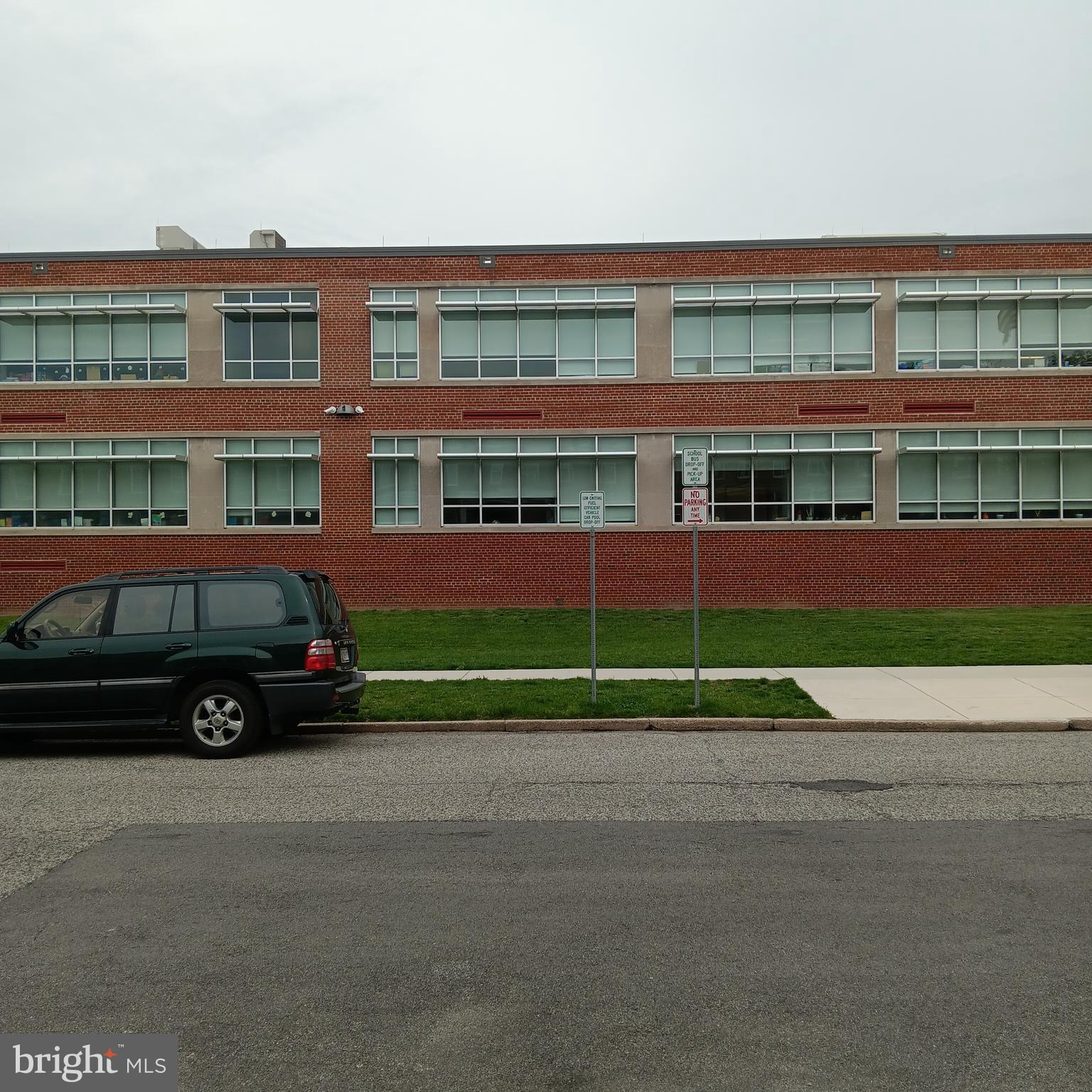 2419 Mosher Street Baltimore, MD 21216 - Photo 18 of 19 a car parked in front of a building