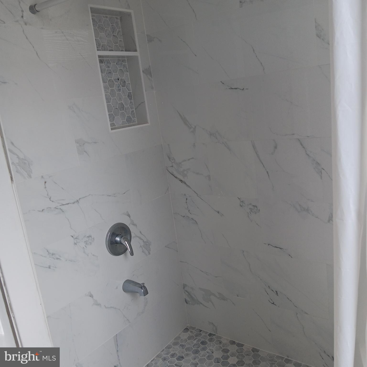 2419 Mosher Street Baltimore, MD 21216 - Photo 6 of 19 a bathroom with a shower