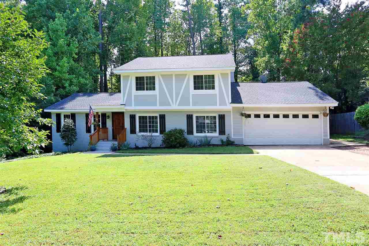 7101 Tanbark Way Raleigh, NC 27615 - Photo 1 of 25 a front view of a house with swimming pool