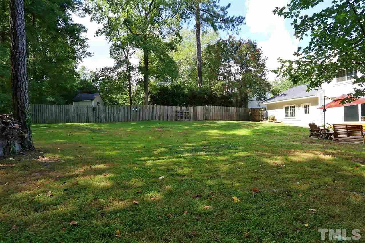 7101 Tanbark Way Raleigh, NC 27615 - Photo 25 of 25 a view of a house with a yard