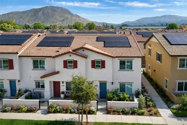 a aerial view of a house with a yard
