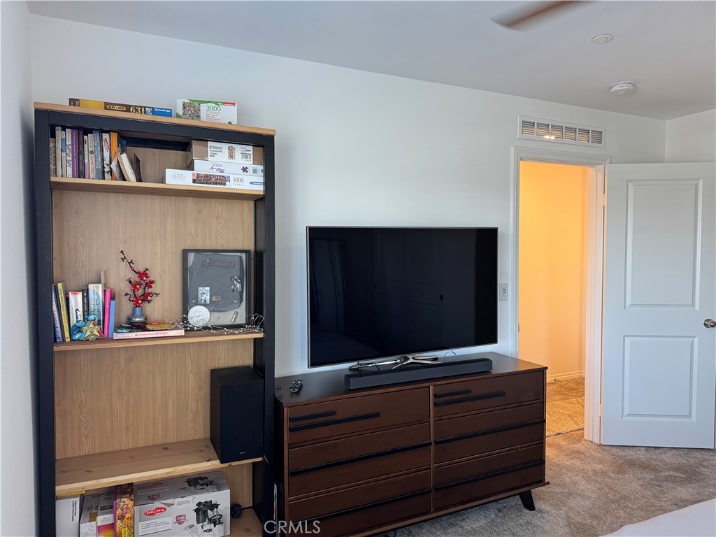 19167 Sequoia Grv Street Riverside, CA 92507 - Photo 15 of 30 a living room with furniture and a flat screen tv