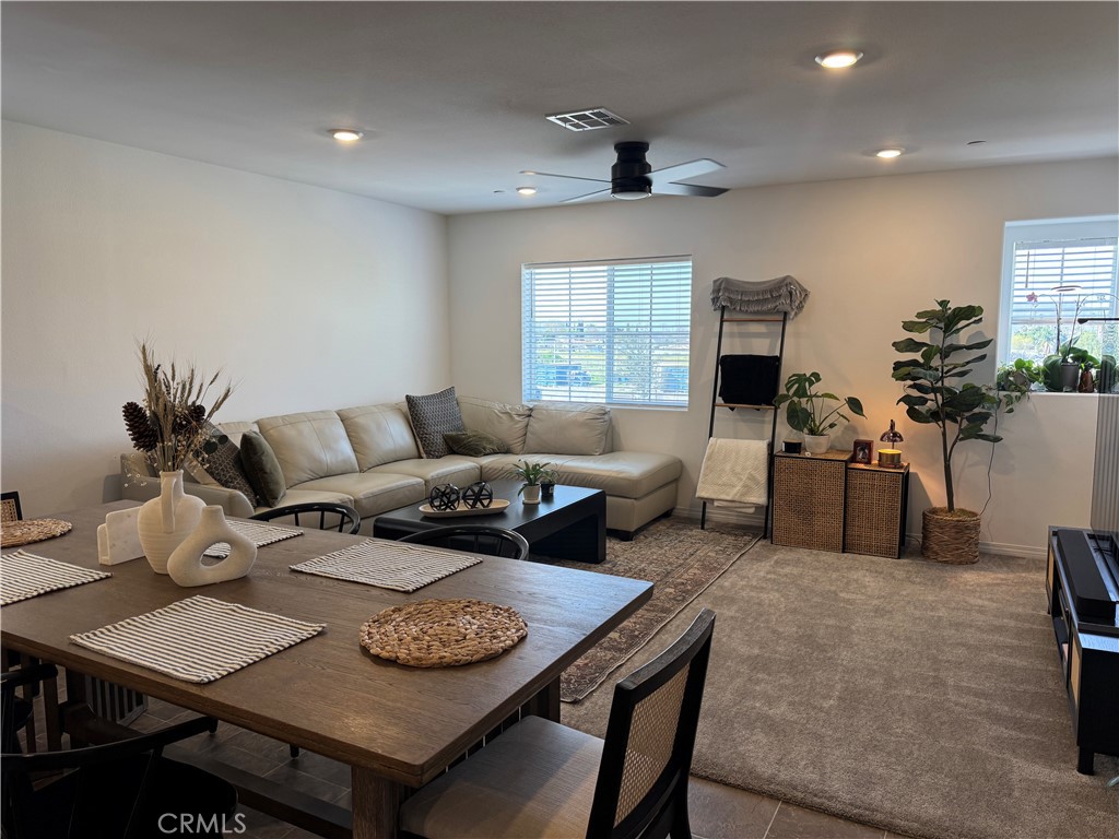 19167 Sequoia Grv Street Riverside, CA 92507 - Photo 16 of 30 a living room with furniture and wooden floor