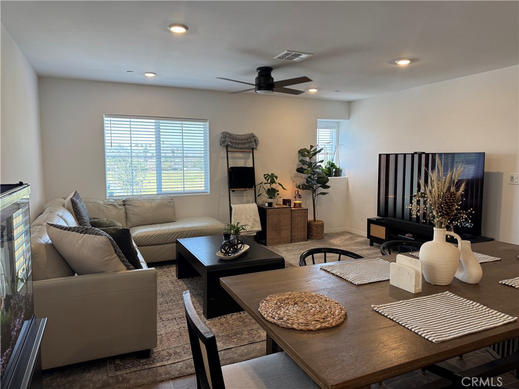 19167 Sequoia Grv Street Riverside, CA 92507 - Photo 27 of 30 a living room with furniture and wooden floor