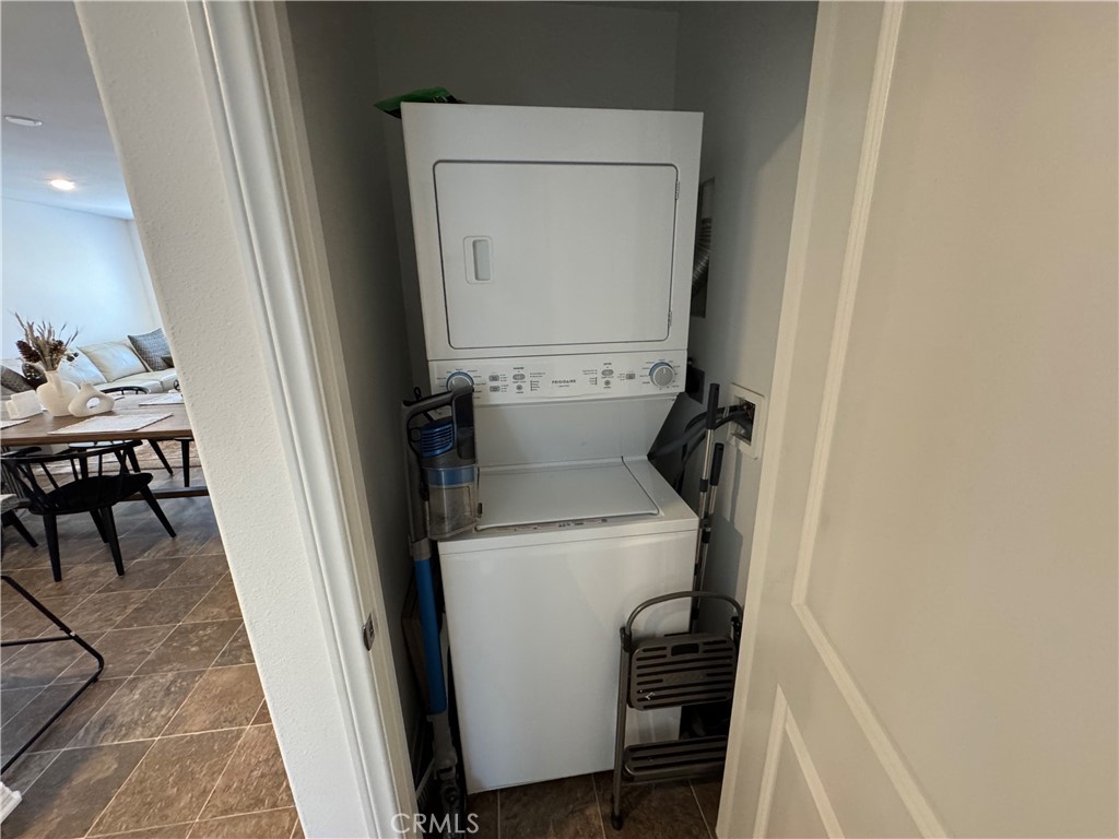19167 Sequoia Grv Street Riverside, CA 92507 - Photo 29 of 30 a utility room with dryer and washer
