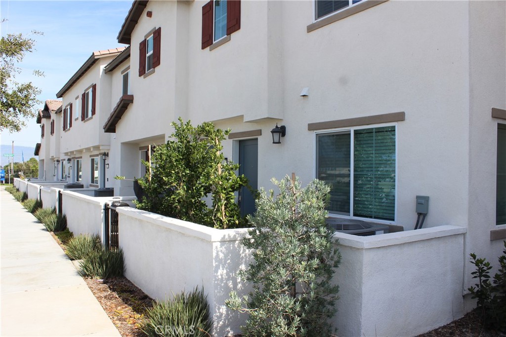 19167 Sequoia Grv Street Riverside, CA 92507 - Photo 3 of 30 a view of a house with backyard and sitting area