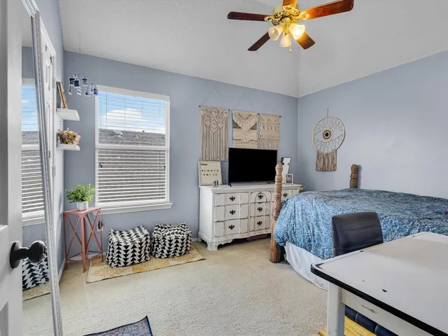 a bathroom with a sink toilet a shower and a mirror