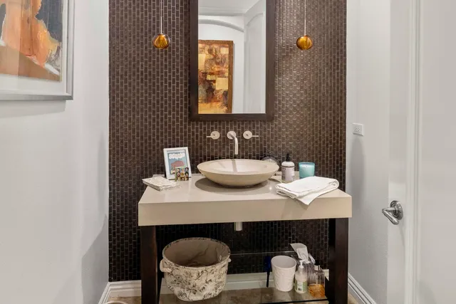 a view of a house with sitting area and garden