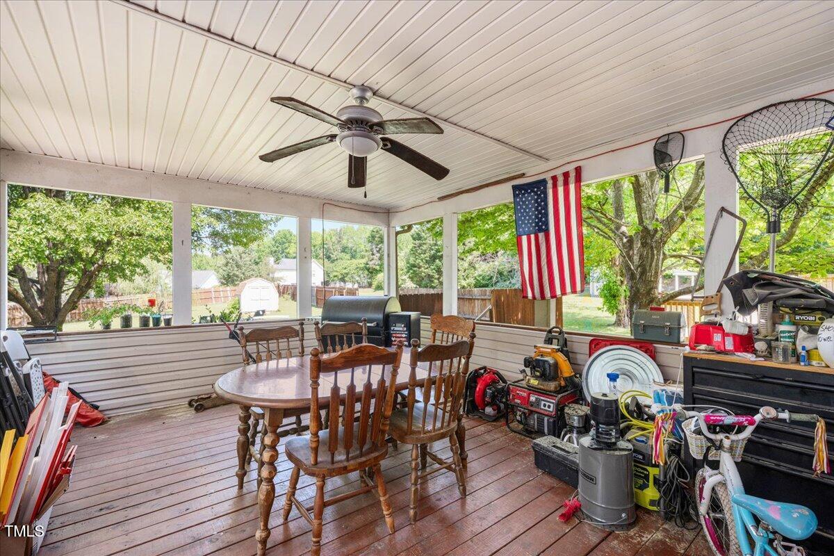 604 Sinewell Drive Wake Forest, NC 27587 - Photo 12 of 25 a view of a dining room with furniture water view and a chandelier