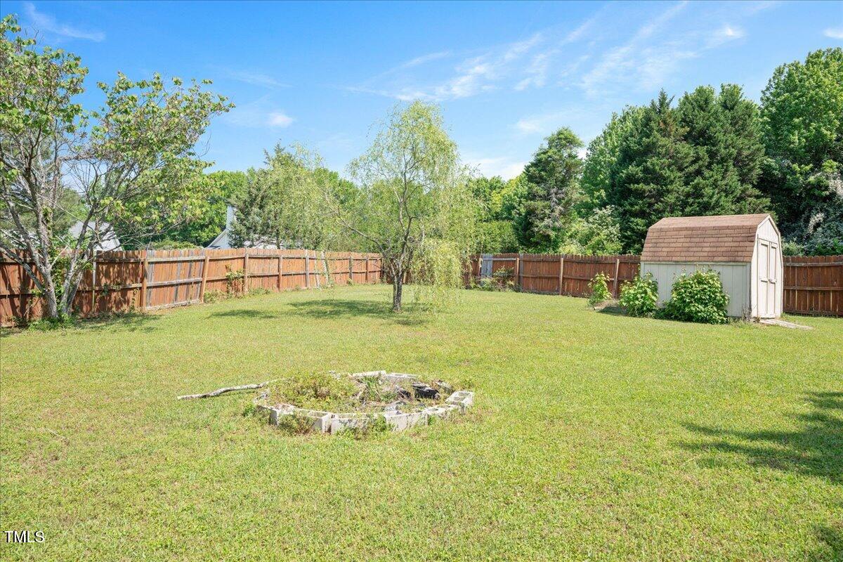 604 Sinewell Drive Wake Forest, NC 27587 - Photo 25 of 25 a view of a house with a big yard