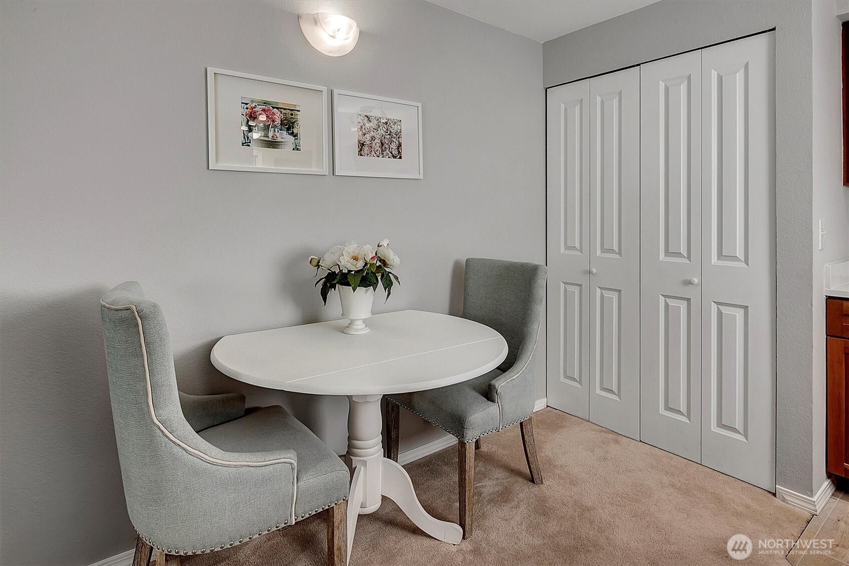 300 10th Avenue, Unit B205 Seattle, WA 98122 - Photo 3 of 27 a view of a dining room with furniture and wooden floor