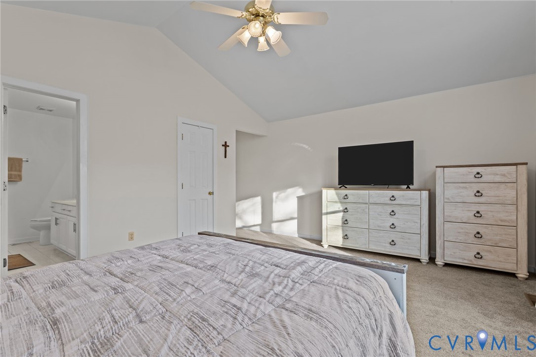 518 Rebel Ridge Road Colonial Heights, VA 23834 - Photo 32 of 44 a bedroom with a bed and flat screen tv