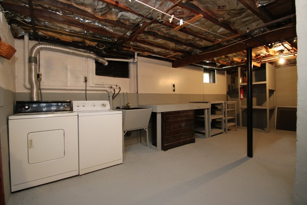 85 Riverbank Road Saugus, MA 01906 - Photo 14 of 20 a utility room with dryer and washer