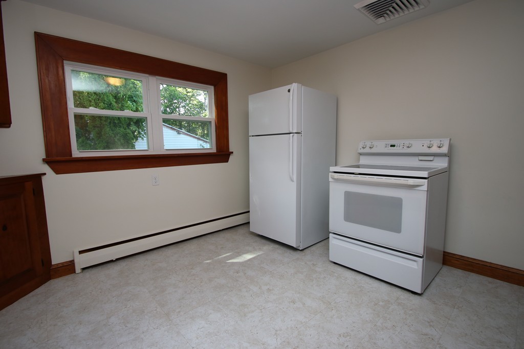 85 Riverbank Road Saugus, MA 01906 - Photo 5 of 20 a utility room with dryer and washer