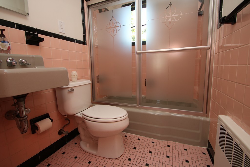 85 Riverbank Road Saugus, MA 01906 - Photo 10 of 20 a bathroom with a sink toilet and shower