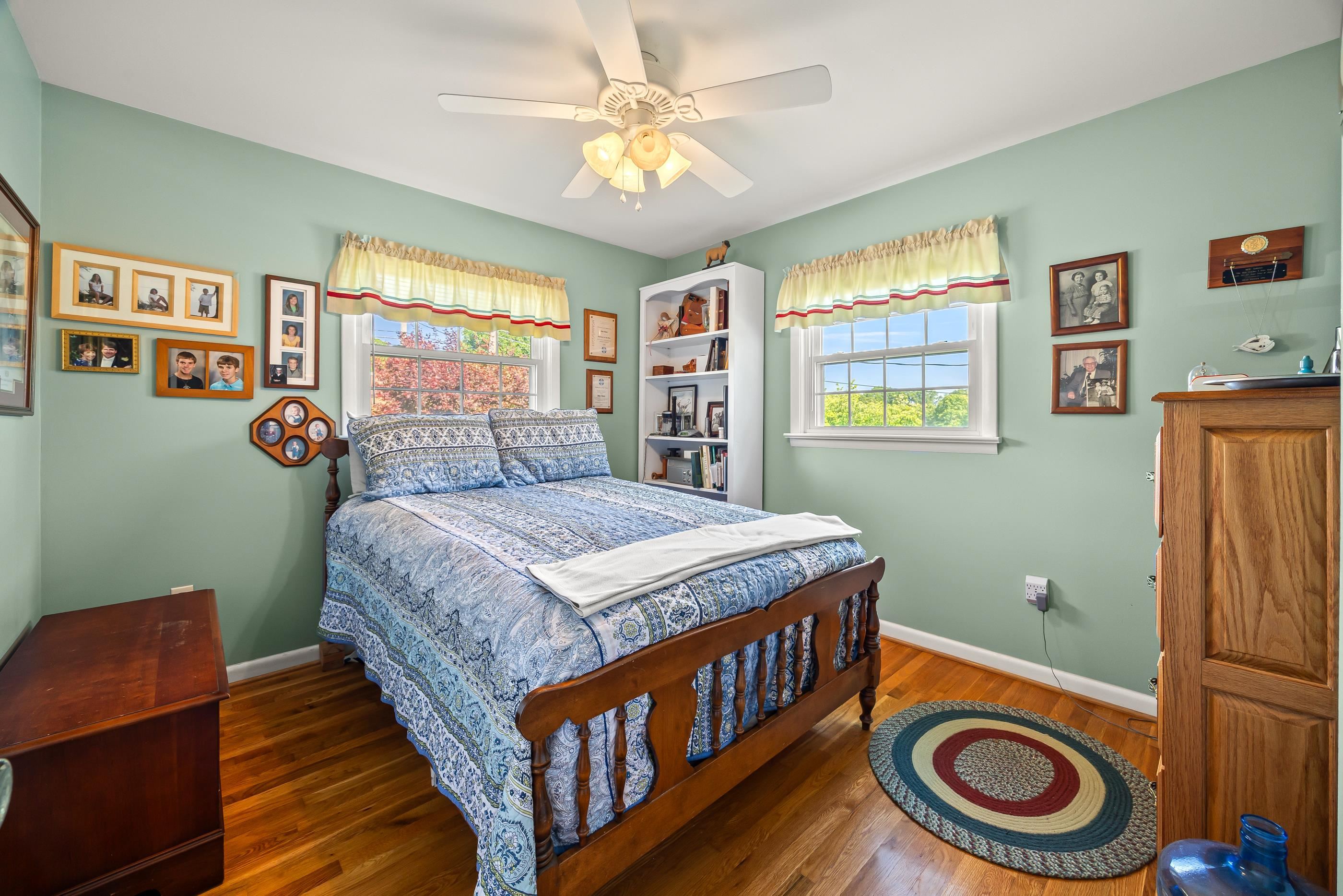 208 Tuxedo Road Staunton, VA 24401 - Photo 26 of 46 a bedroom with a bed and a chandelier