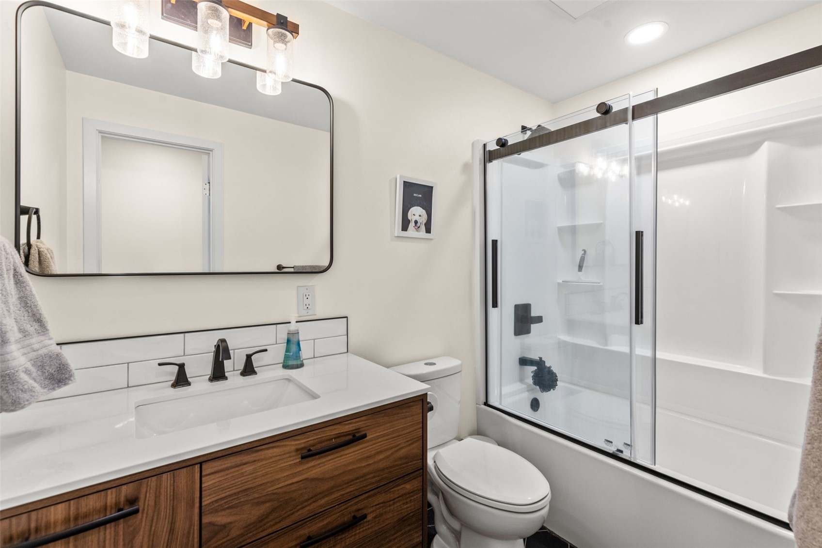 1127 Ski Hill Road, Unit 104 Breckenridge, CO 80424 - Photo 18 of 32 a bathroom with a sink a toilet and shower