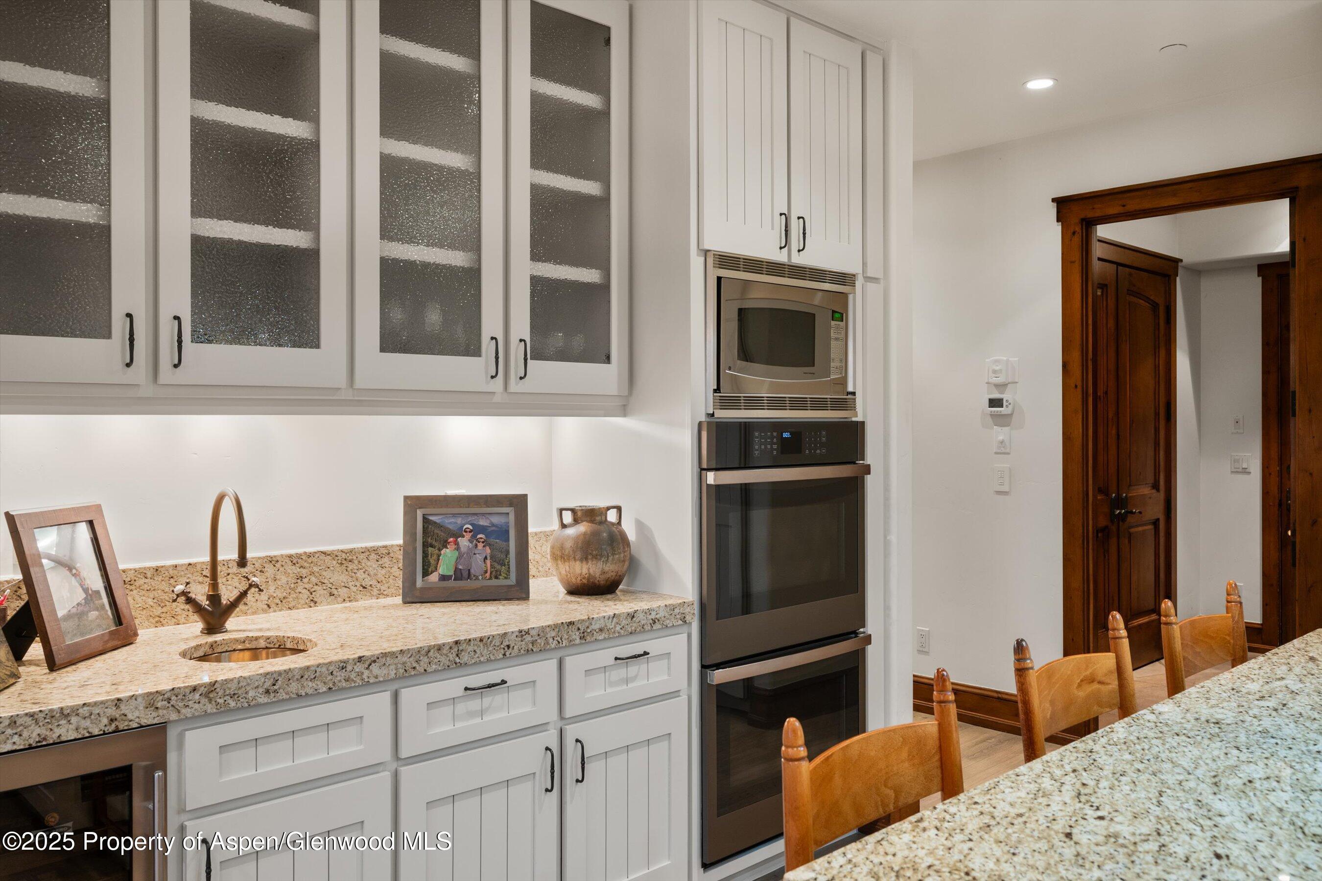 1430 Sierra Vista Drive Aspen, CO 81611 - Photo 12 of 57 a kitchen with stainless steel appliances granite countertop a stove and a sink
