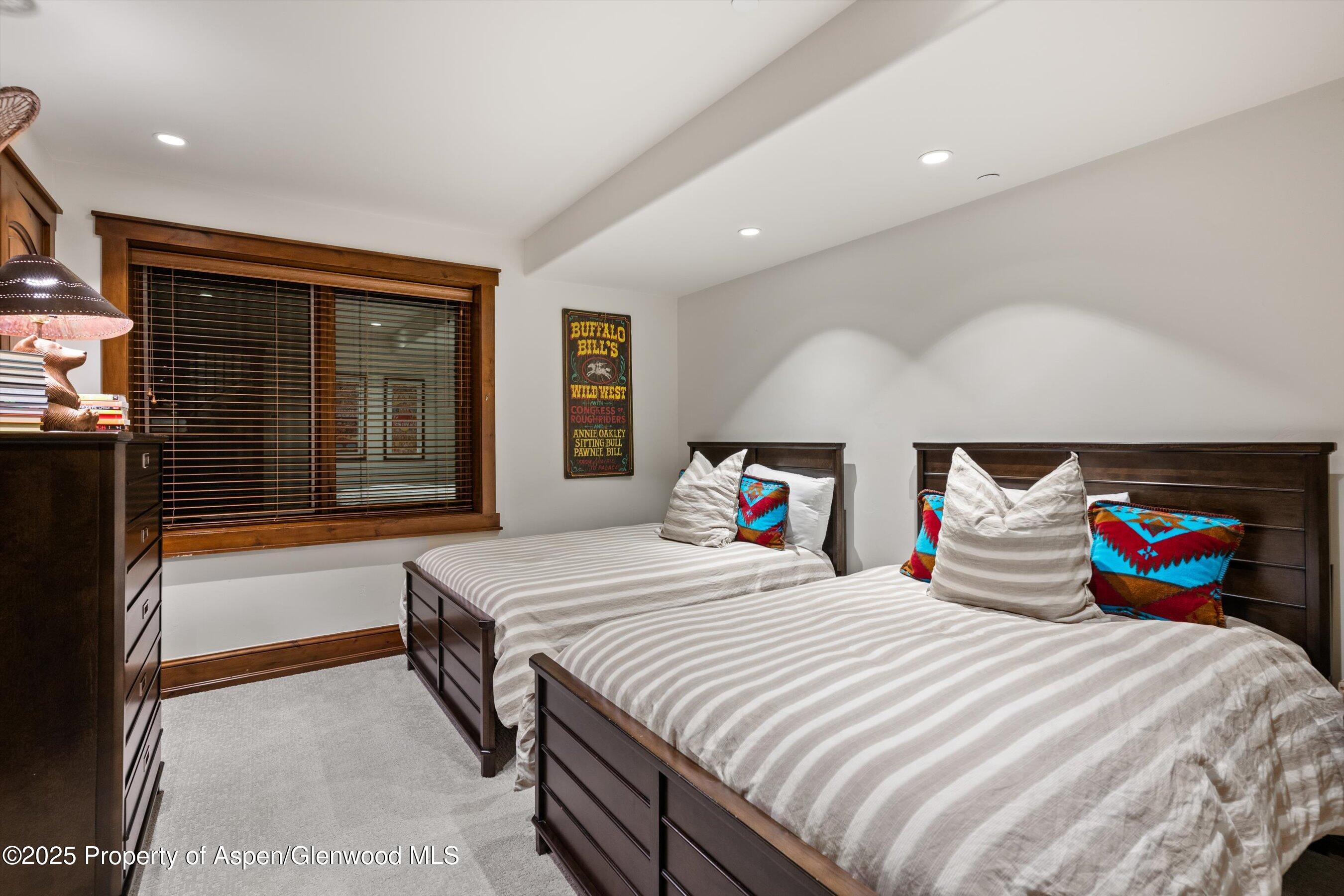 1430 Sierra Vista Drive Aspen, CO 81611 - Photo 18 of 57 a bedroom with bed and window