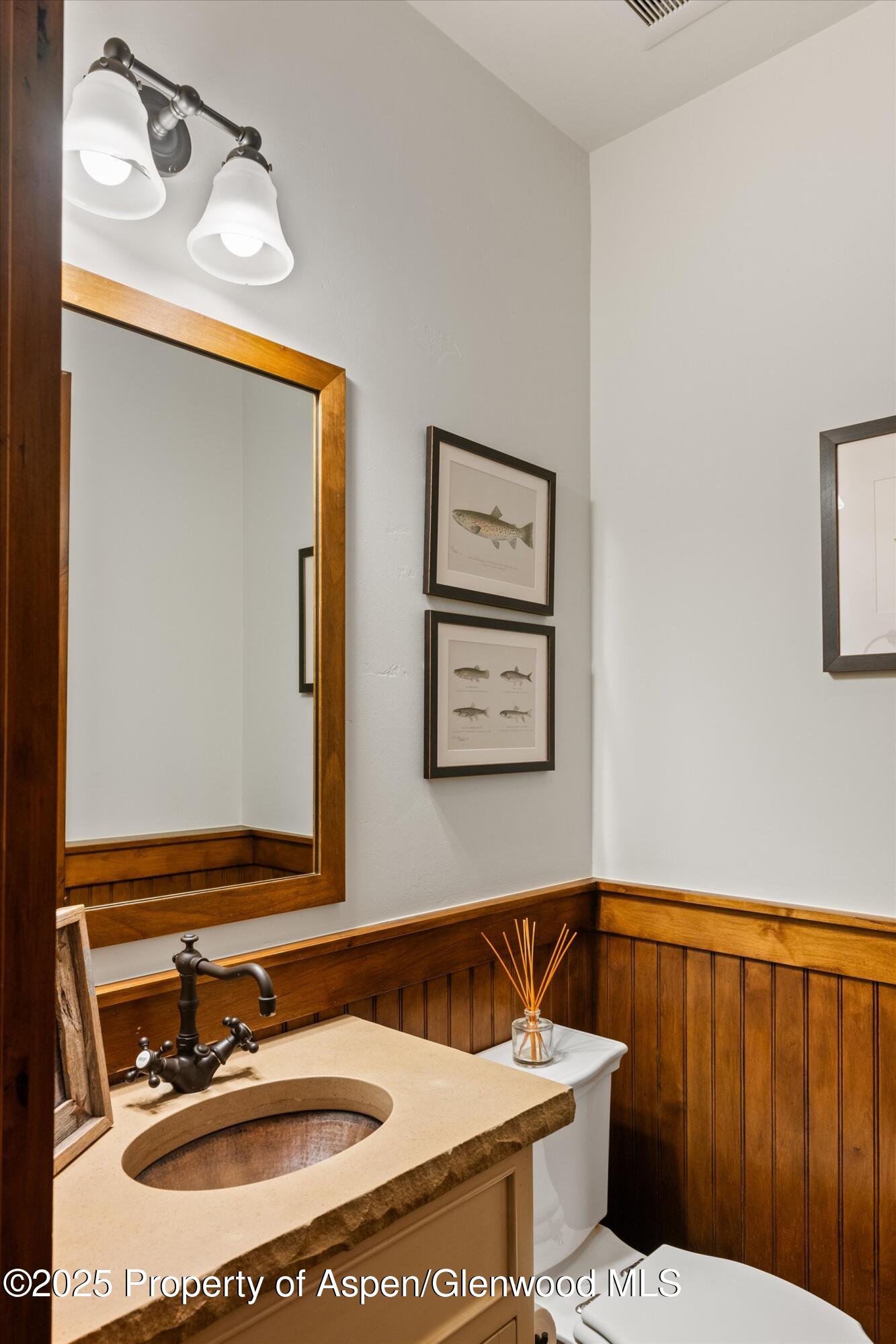 1430 Sierra Vista Drive Aspen, CO 81611 - Photo 29 of 57 a bathroom with a sink and a mirror