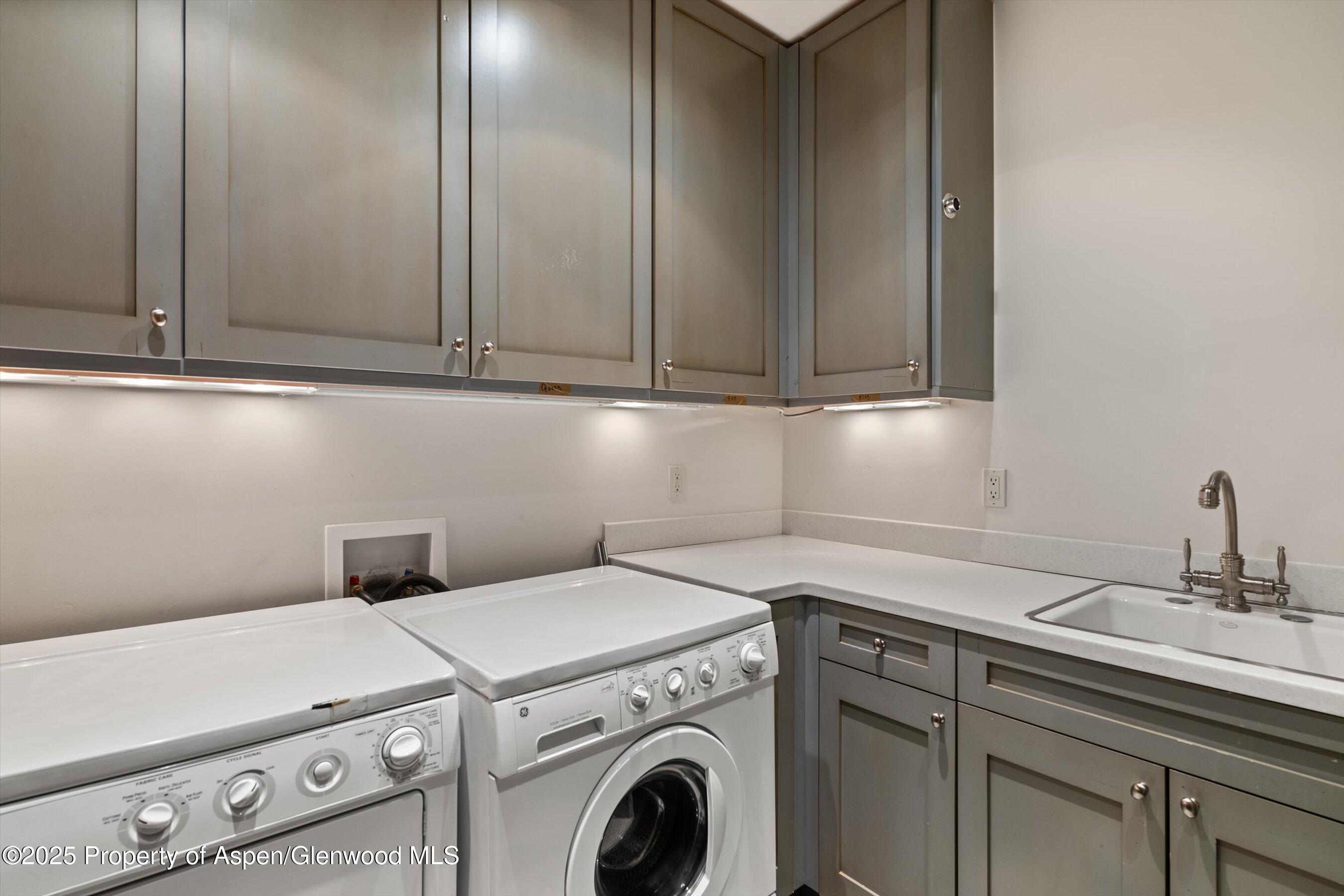 1430 Sierra Vista Drive Aspen, CO 81611 - Photo 38 of 57 a view of storage and utility room with washer and dryer