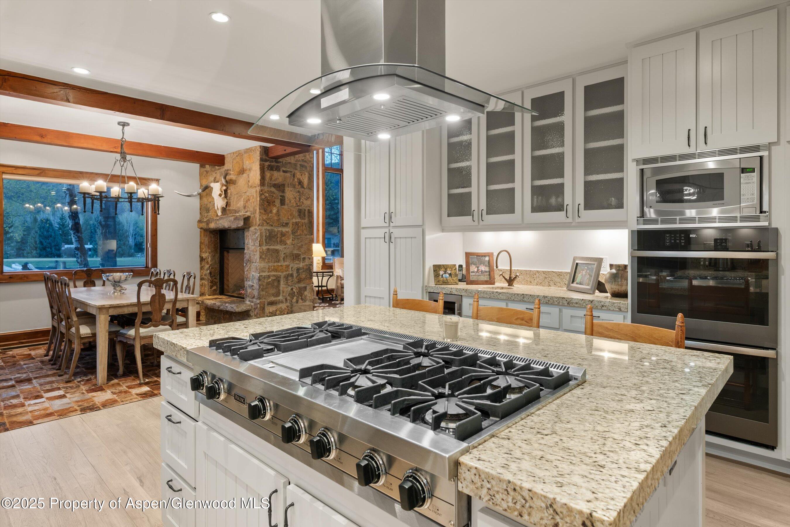 1430 Sierra Vista Drive Aspen, CO 81611 - Photo 5 of 57 a kitchen with a stove a sink and a refrigerator