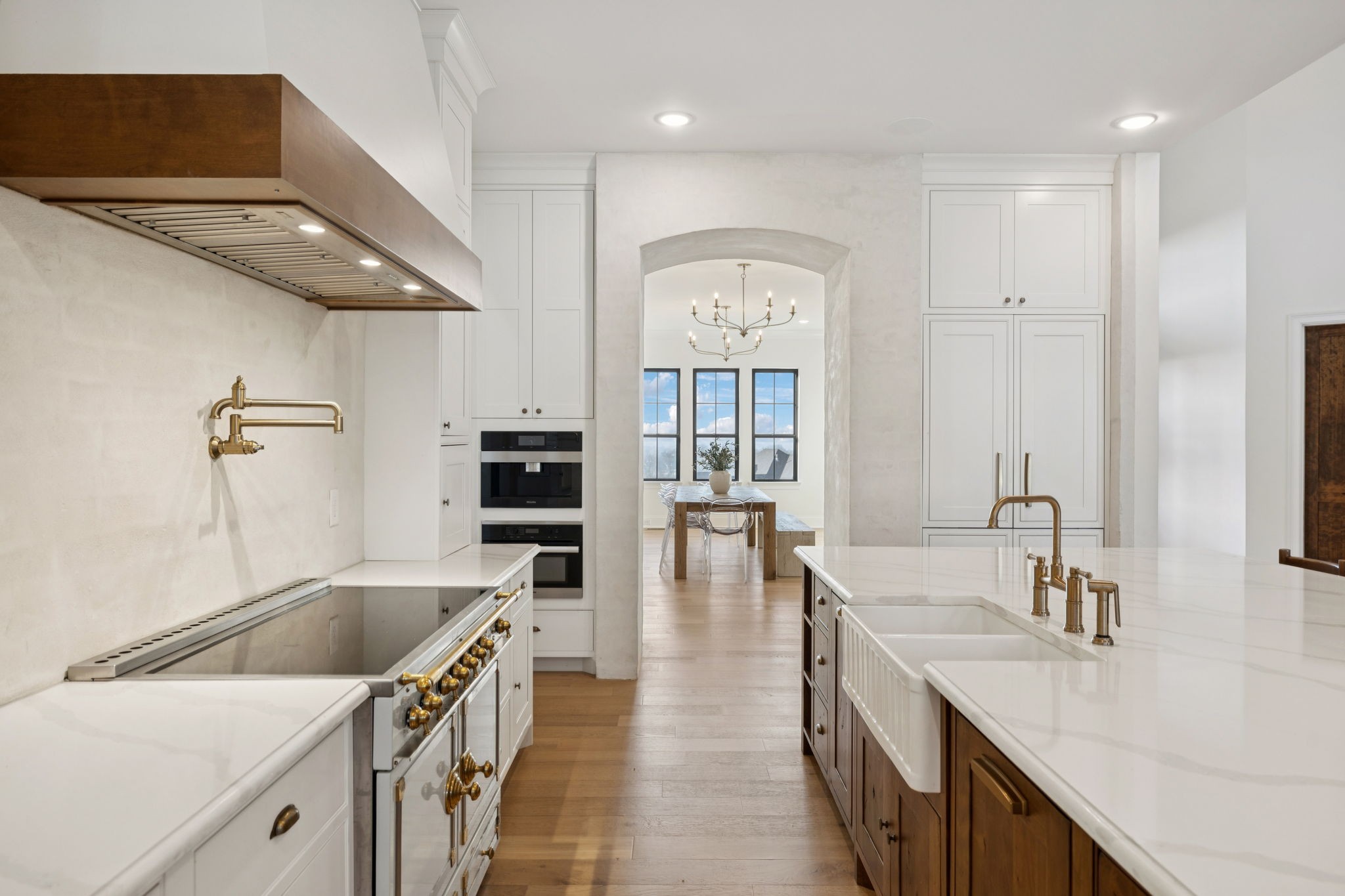 6128 Lookaway Circle Franklin, TN 37067 - Photo 27 of 89 a kitchen with stainless steel appliances granite countertop a sink a stove and a refrigerator