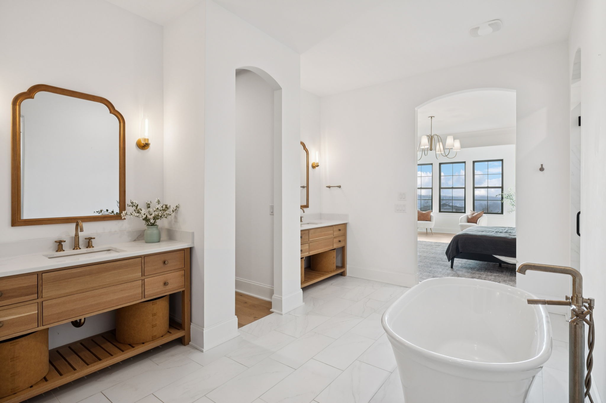 6128 Lookaway Circle Franklin, TN 37067 - Photo 37 of 89 a en suite bathroom with a double vanity sink a mirror and a bathtub