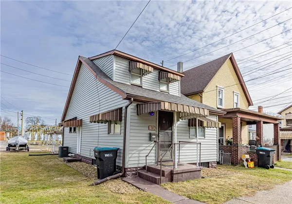 a view of a house with a swimming pool